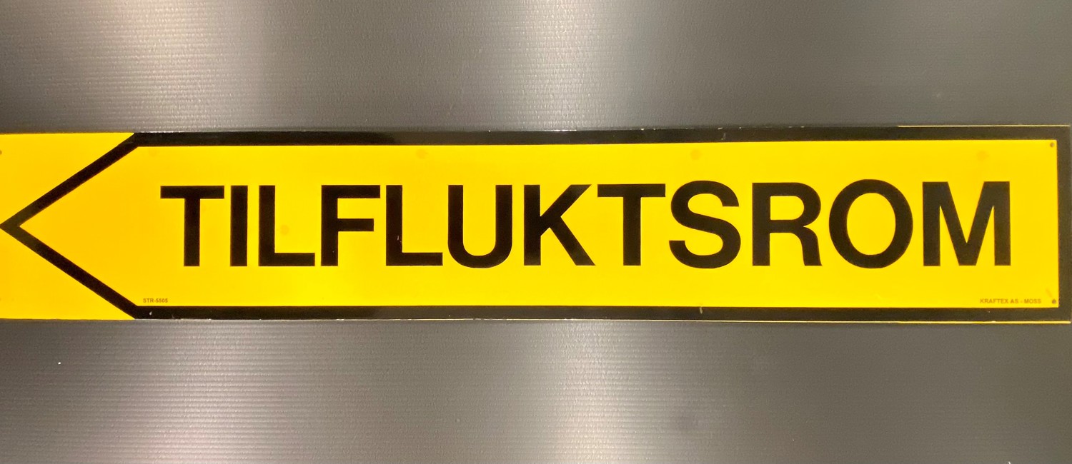 Tilfluktsrom Skilt6 V